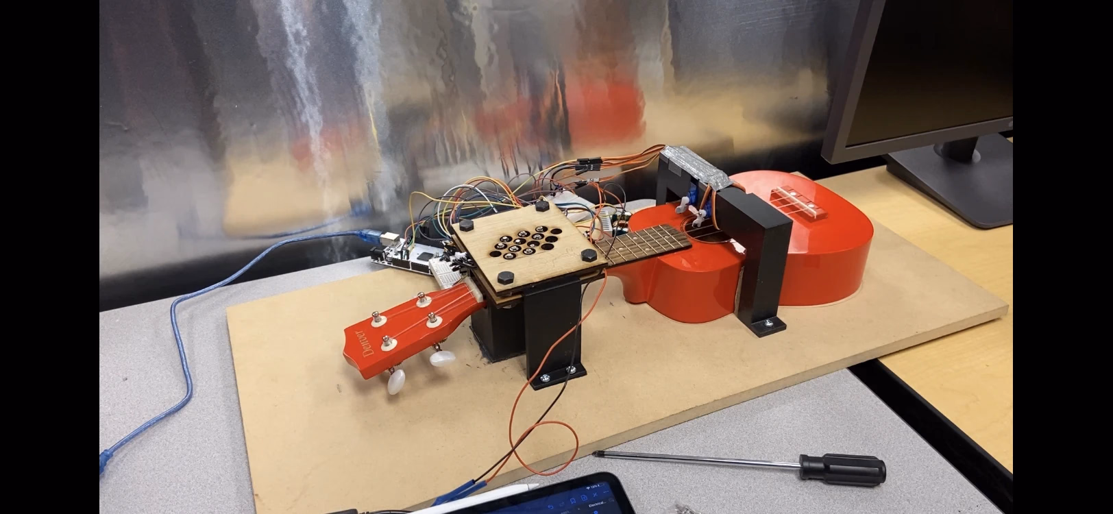 The Ukebox prototype — the ukulele-jukebox hybrid built for IGEN 230